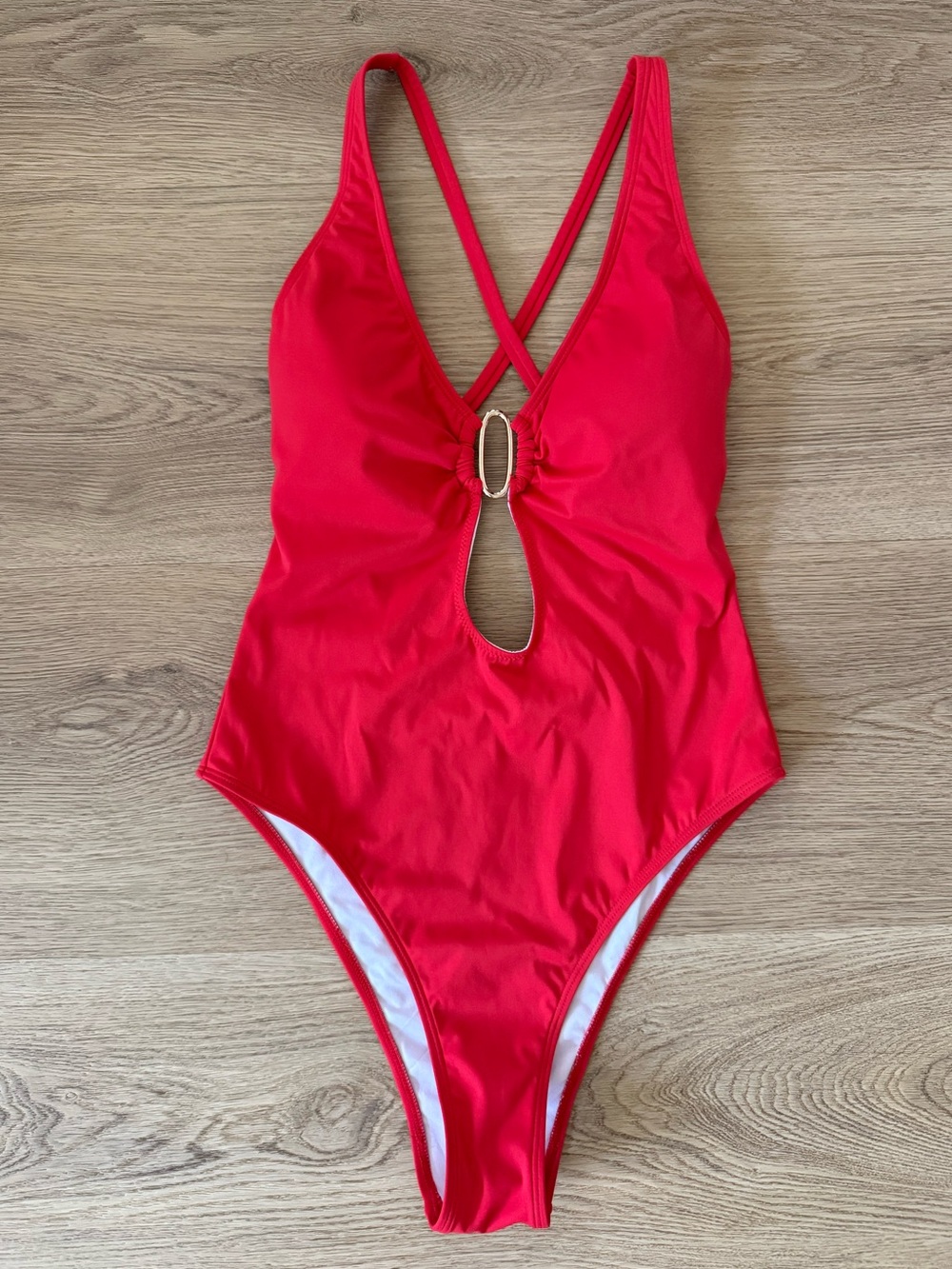 Red one piece swimsuit with open back